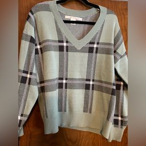 Like new barely worn sweater. Very soft material